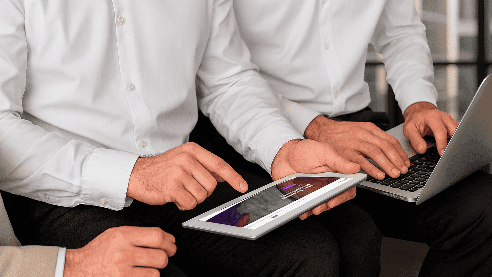 Hands-on teamwork with digital tools and technology for business success.